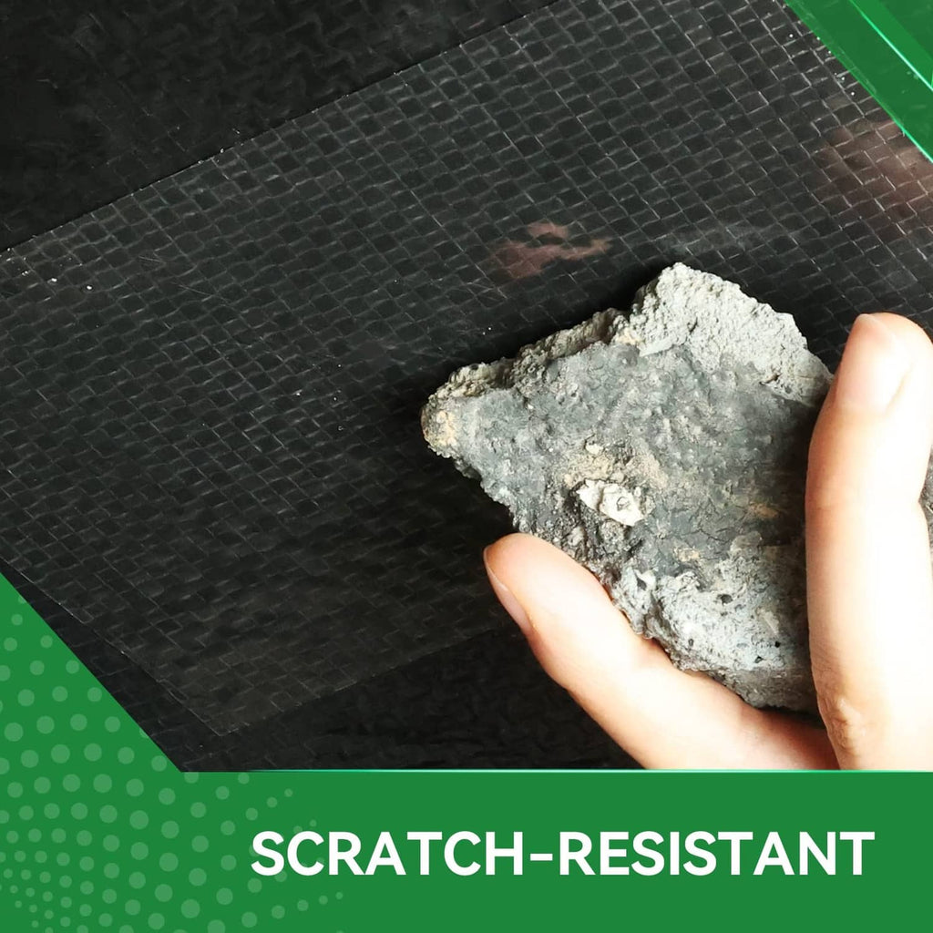 Black RV underbelly repair tape being applied to a crack on a textured surface