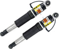 Pair of rear air shock absorbers with black bodies and silver piston rods