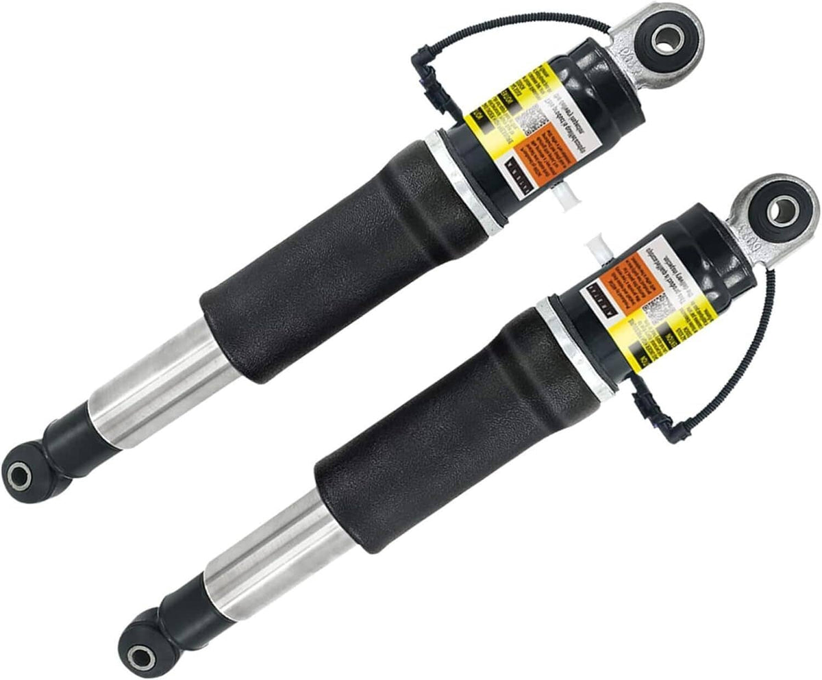 Pair of rear air shock absorbers with black bodies and silver piston rods