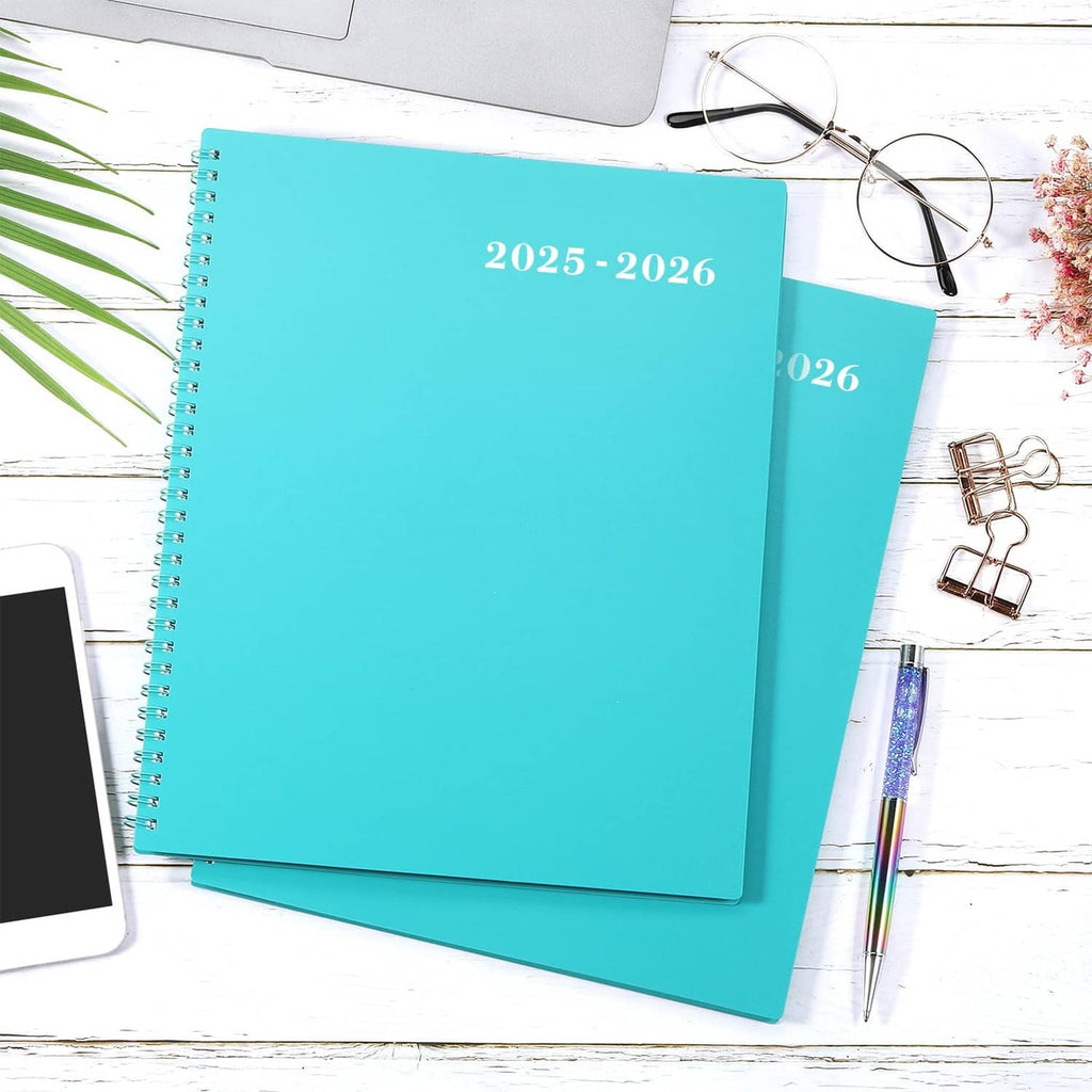 Turquoise 2025-2026 planner with spiral binding, bold “2025-2026” title on the front