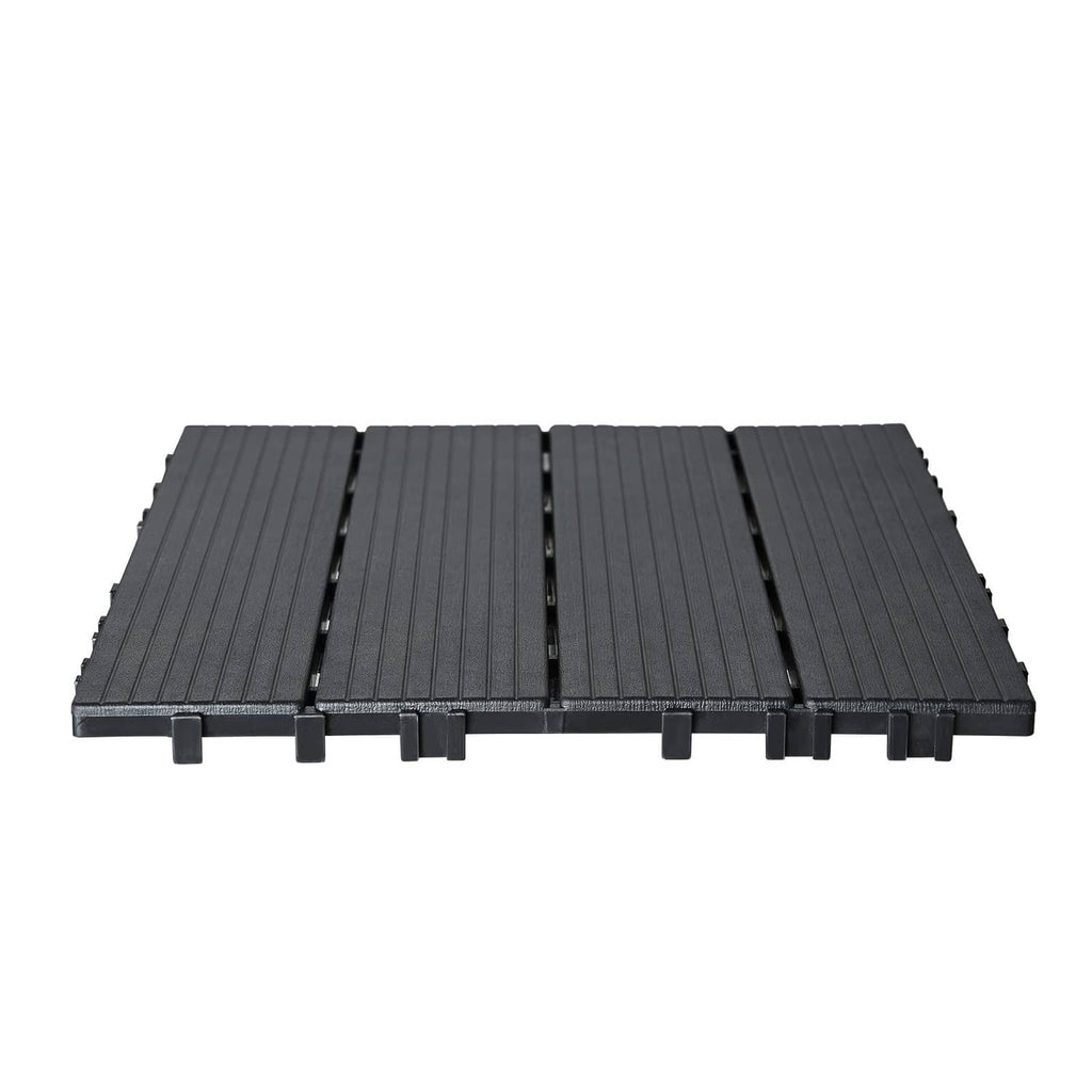 Dark grey plastic interlocking deck tiles set, ribbed panels with locking edges and tabs