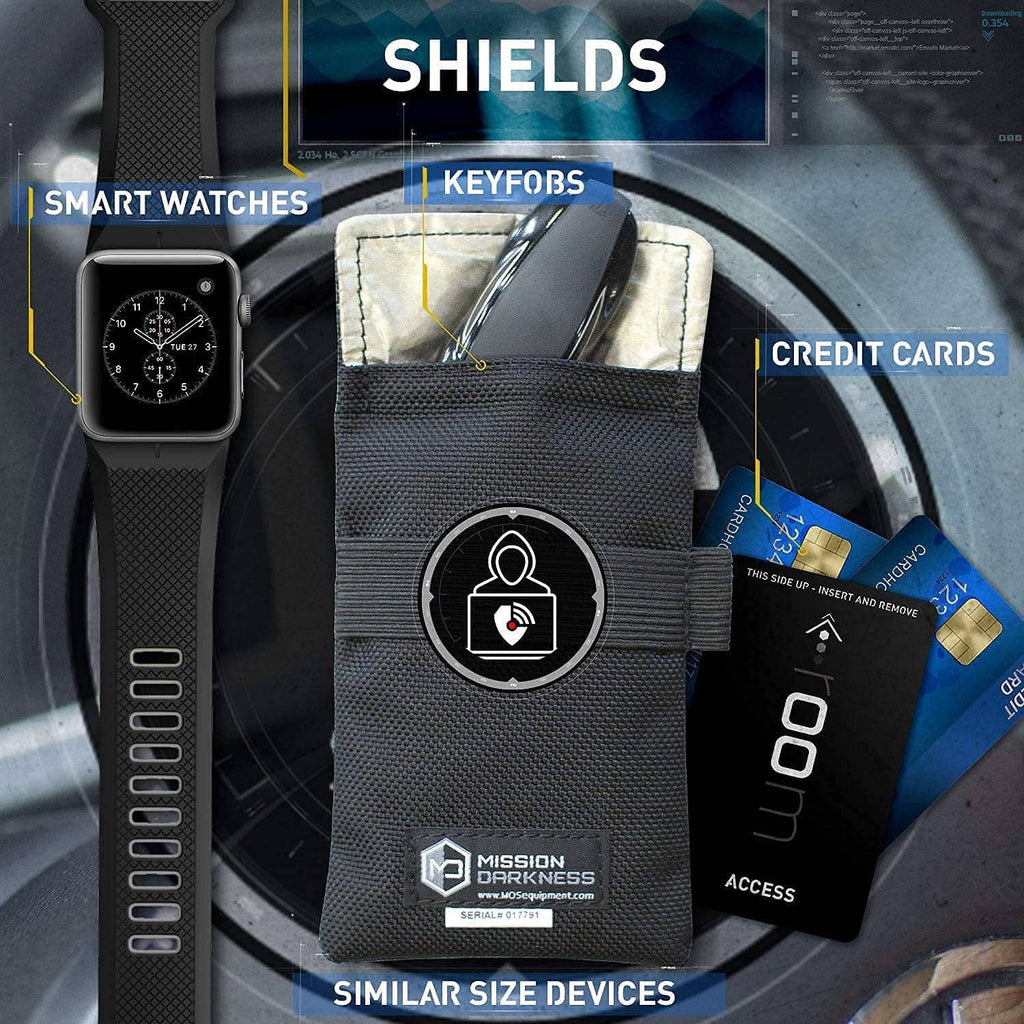 Black Faraday key fob bag with front pocket and Velcro strap, surrounded by small cards