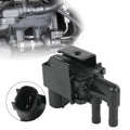 Black vacuum vent valve with two hose ports and electrical connector for automotive use