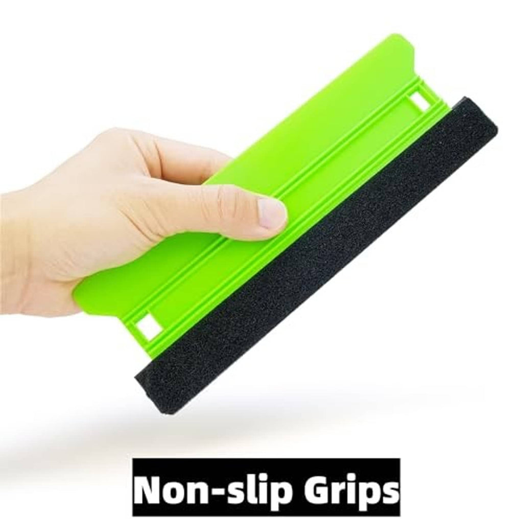Felt edge squeegee with neon green grip and black textured pad, held by hand
