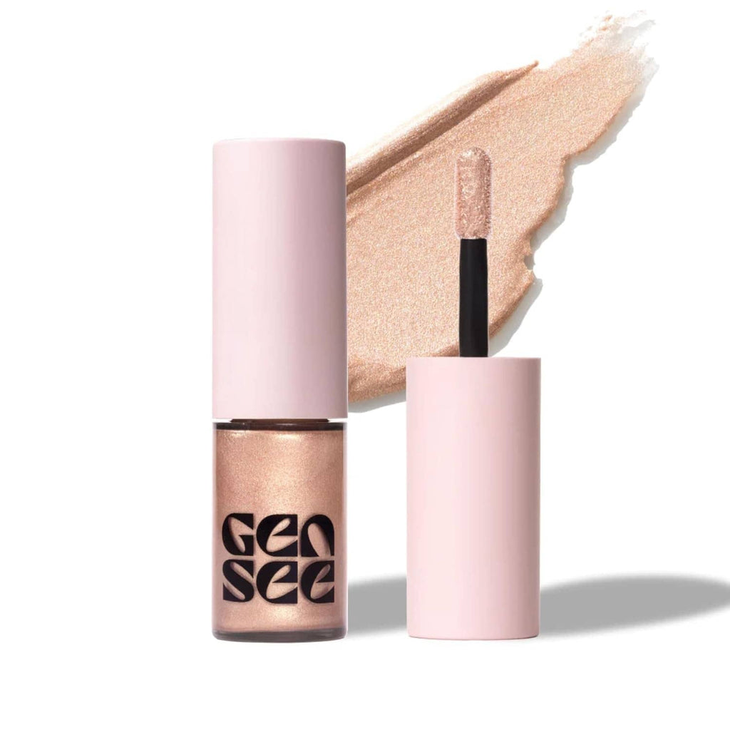Rose-gold metallic liquid eye shadow tube with wand applicator and glossy shimmer swatch