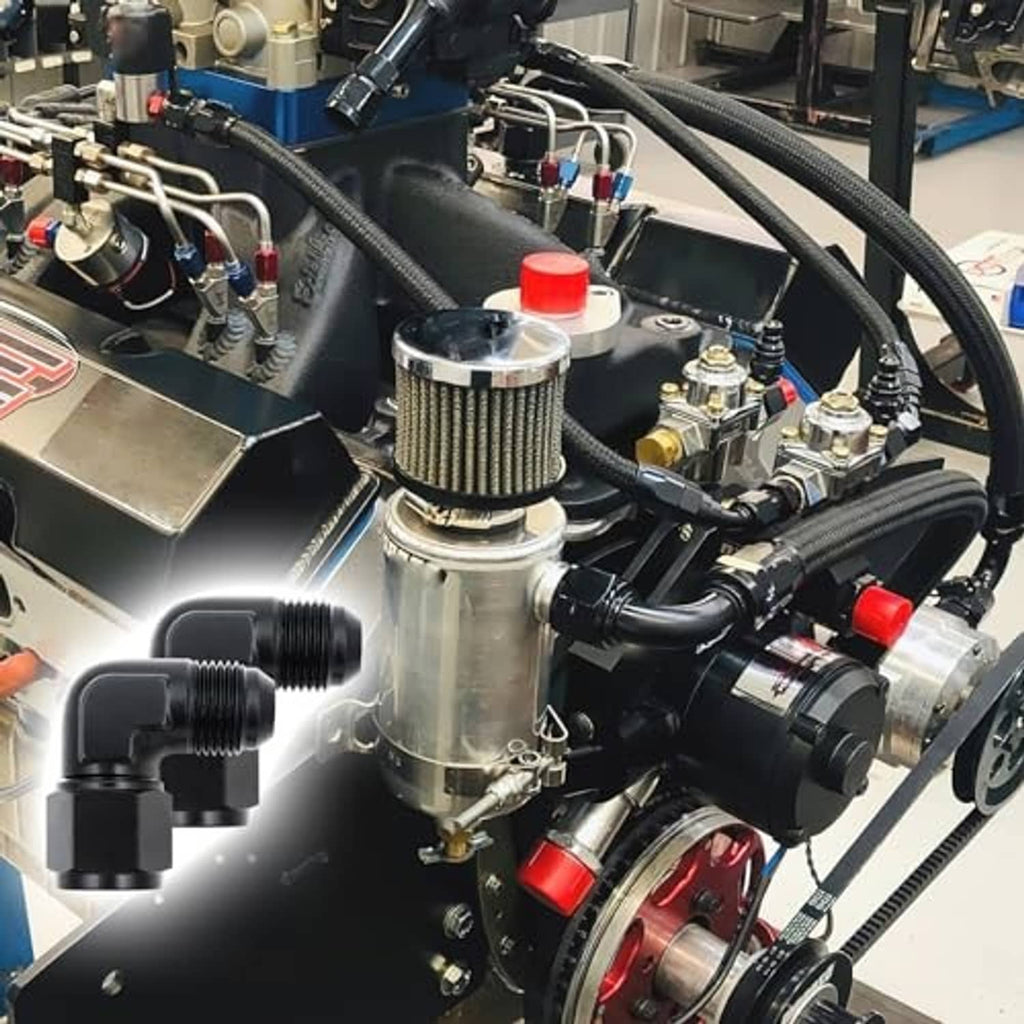 Black 90° AN swivel elbow fitting installed on an engine line