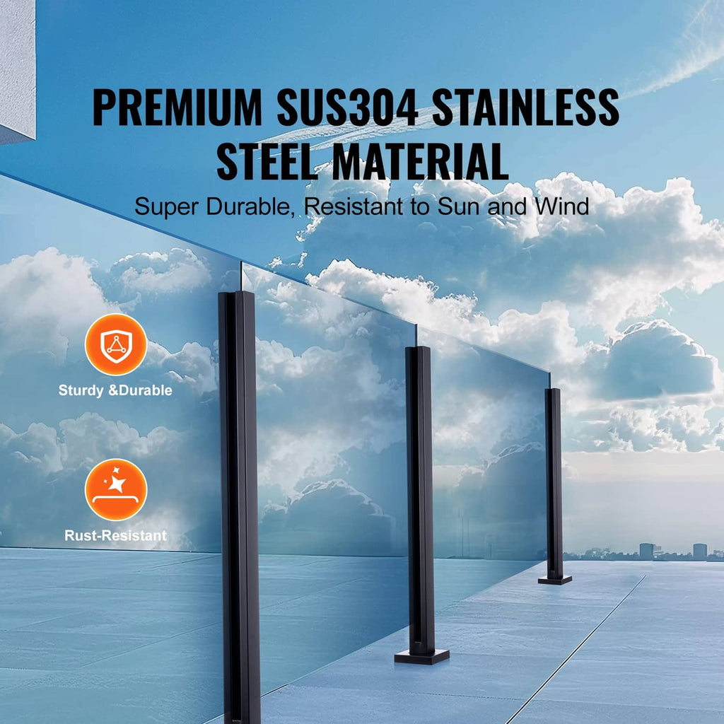 Black glass railing posts standing with rectangular feet for glass panel installation