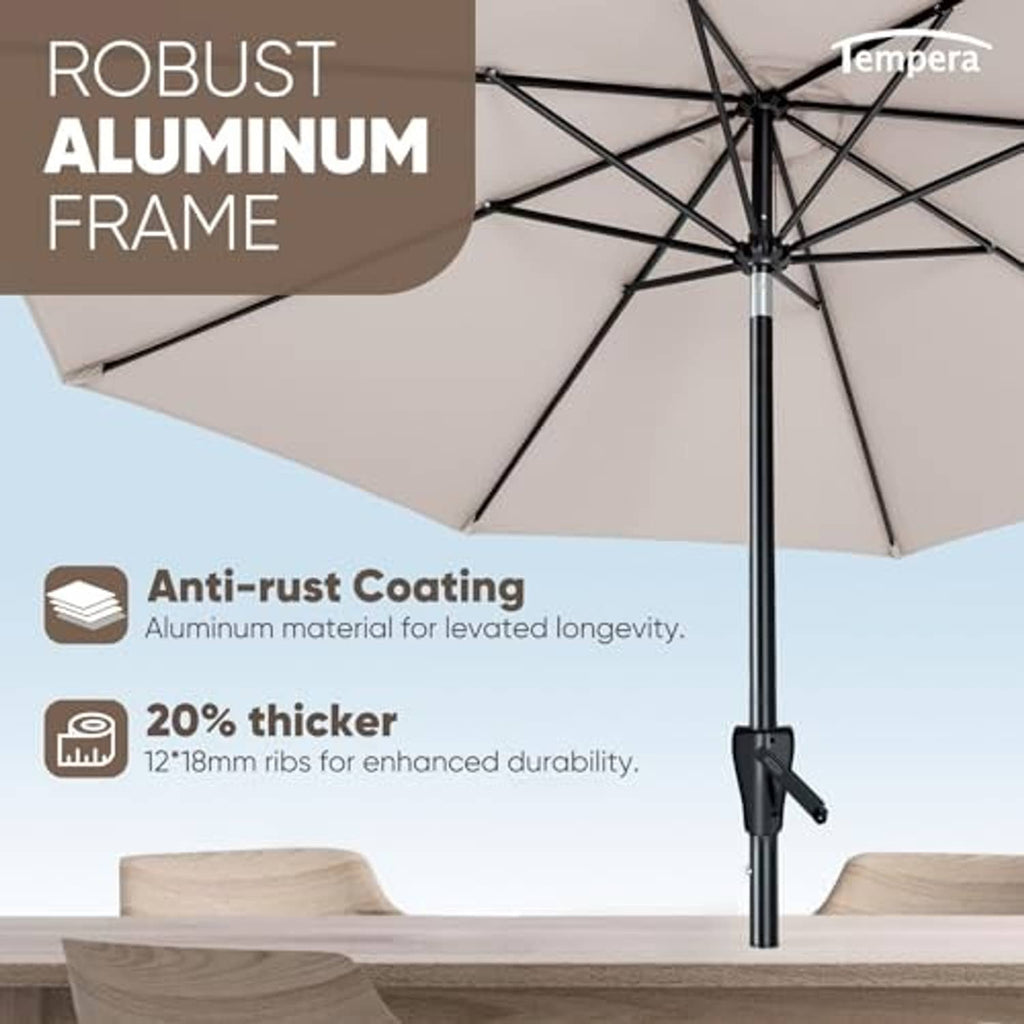 Beige outdoor umbrella with black aluminum frame and sturdy center pole