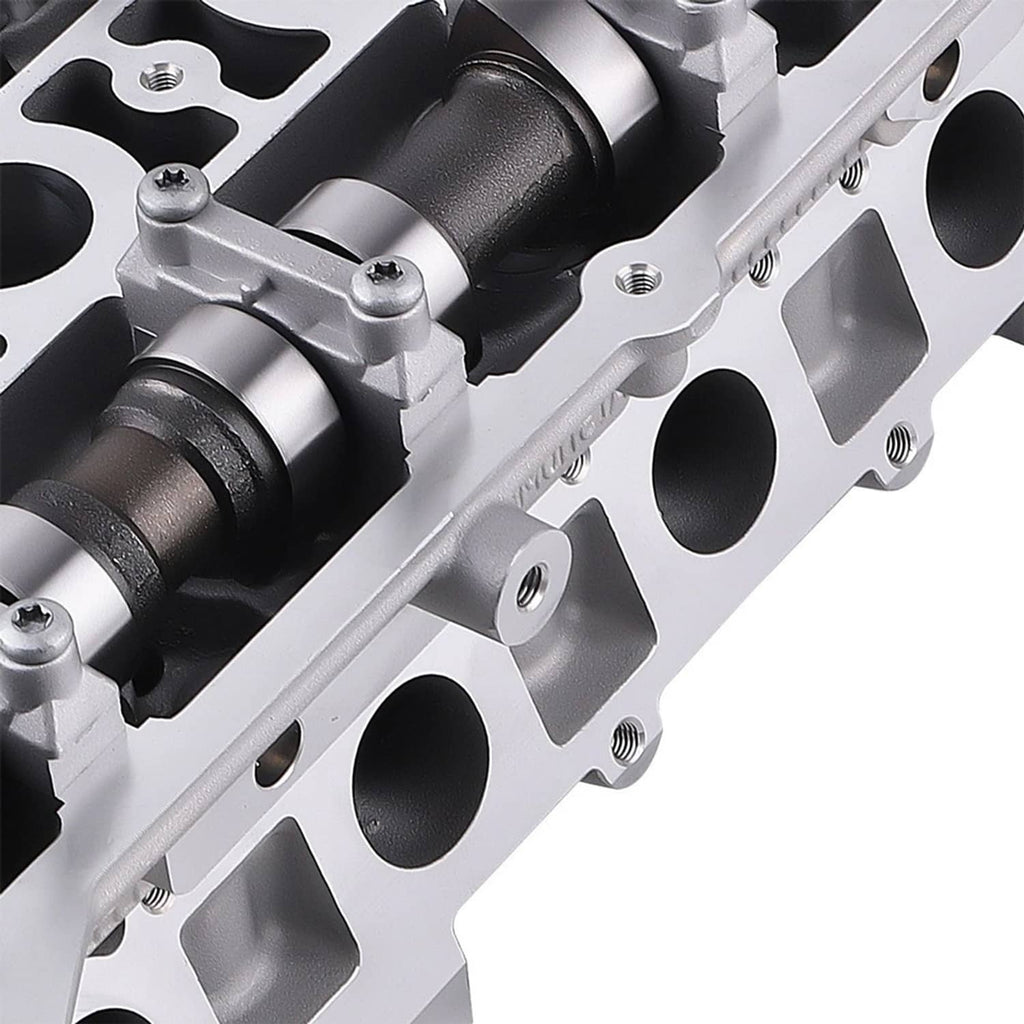 Aluminum alloy cylinder head side view with cylinder ports and camshaft bearing caps