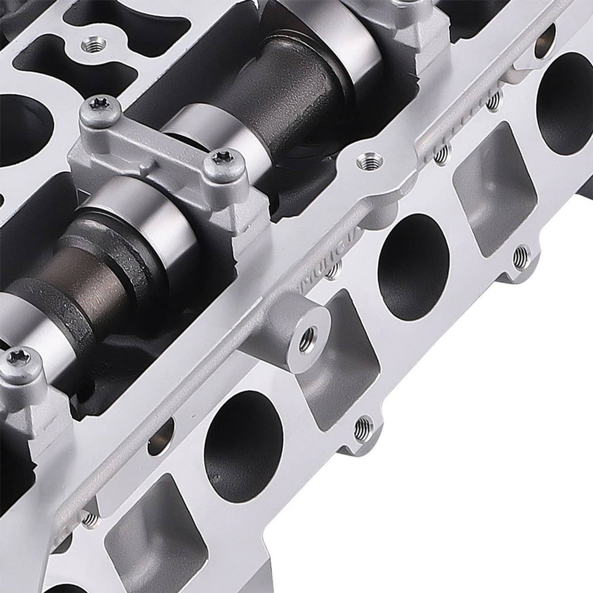 Aluminum alloy cylinder head side view with cylinder ports and camshaft bearing caps