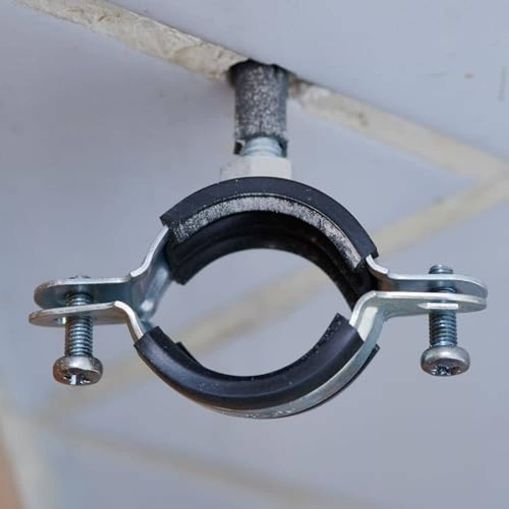 Wall-mounted split ring pipe hanger with black rubber insert and zinc-plated bolts