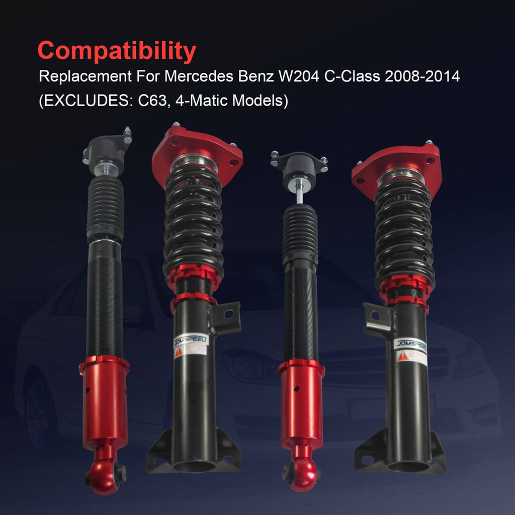Four-piece coilover suspension kit with red upper mounts and black spring assemblies