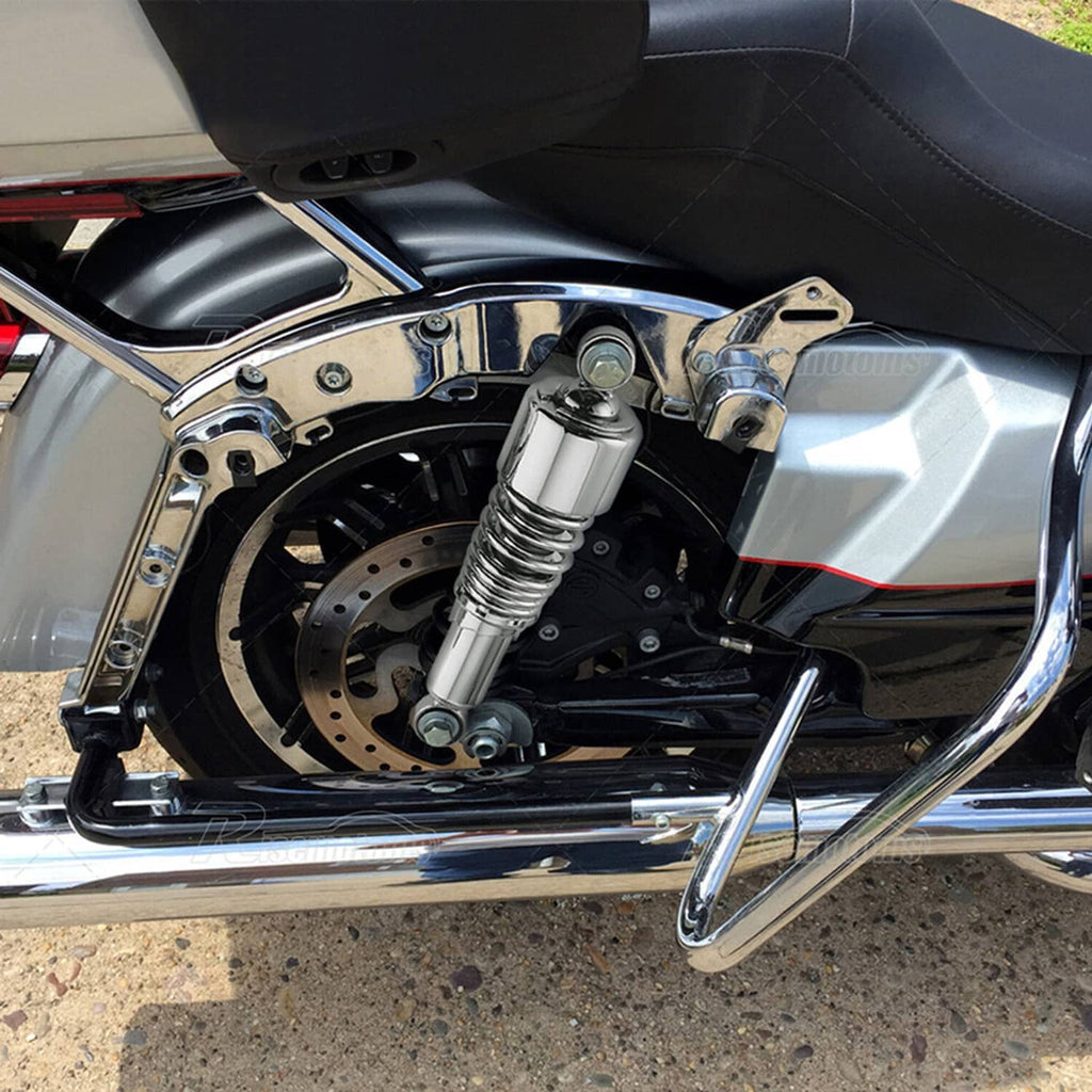 Motorcycle frame area with chrome shock absorber and coiled rear spring