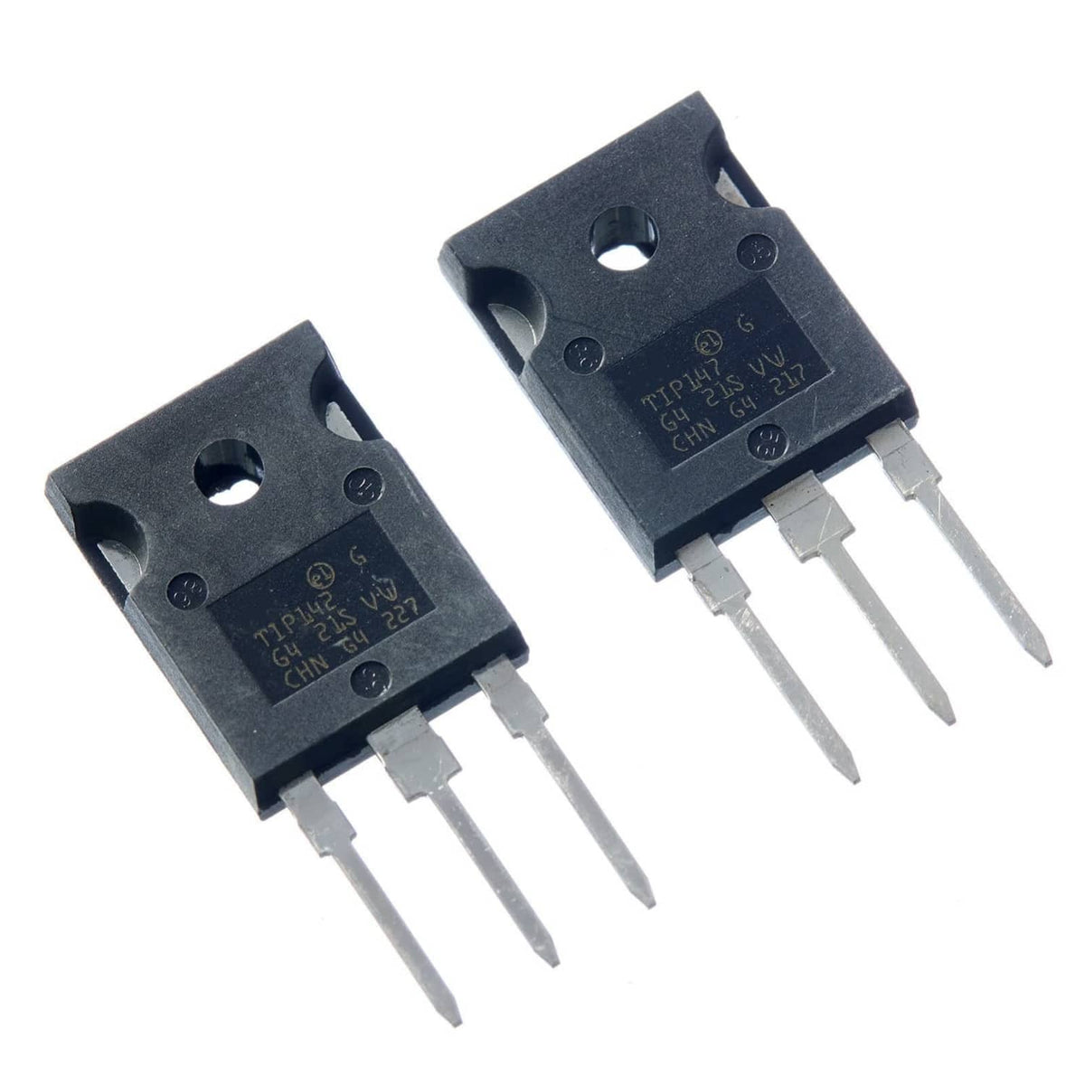 Two black TO-3P transistor packages with three white leads and printed markings on top