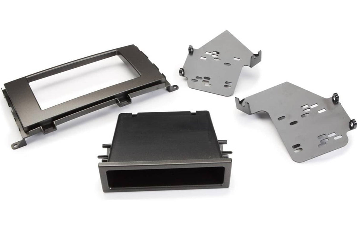 Silver radio dash kit components: brackets, mounting plates, and black bezel