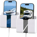 White dual-slot phone holder attached to a wall with phones displayed