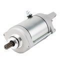 Starter motor with silver aluminum housing and exposed drive shaft