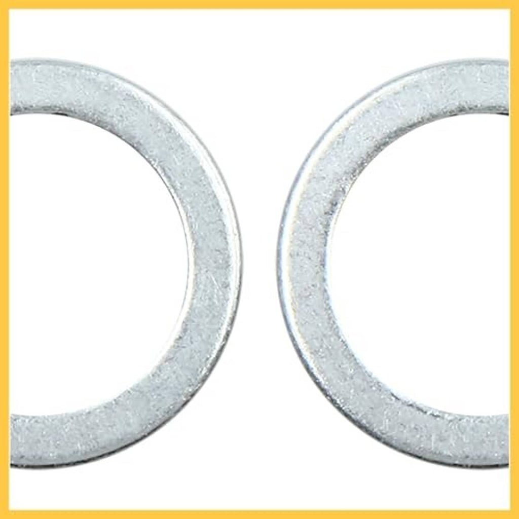 Close-up silver-gray crush washer faces, flat circular rings with inner holes