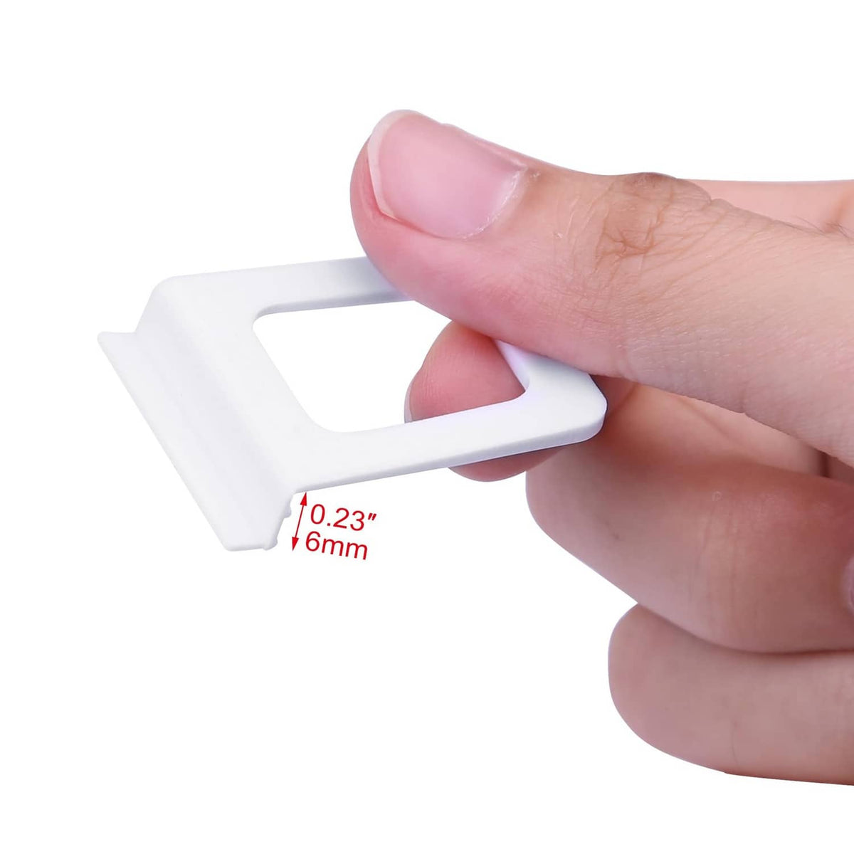 White plastic pull tab held by hand for lifting window screens
