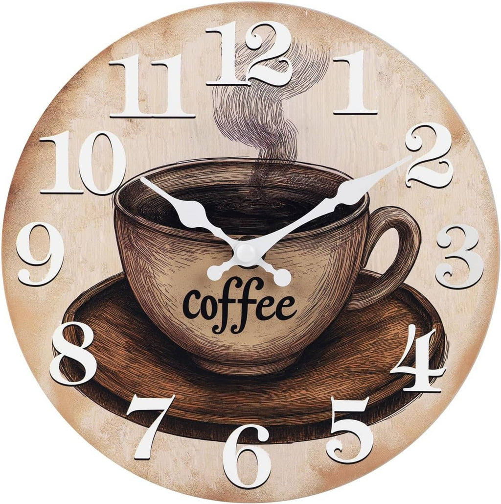 Close-up round wall clock featuring coffee cup artwork, large numerals, and white hands