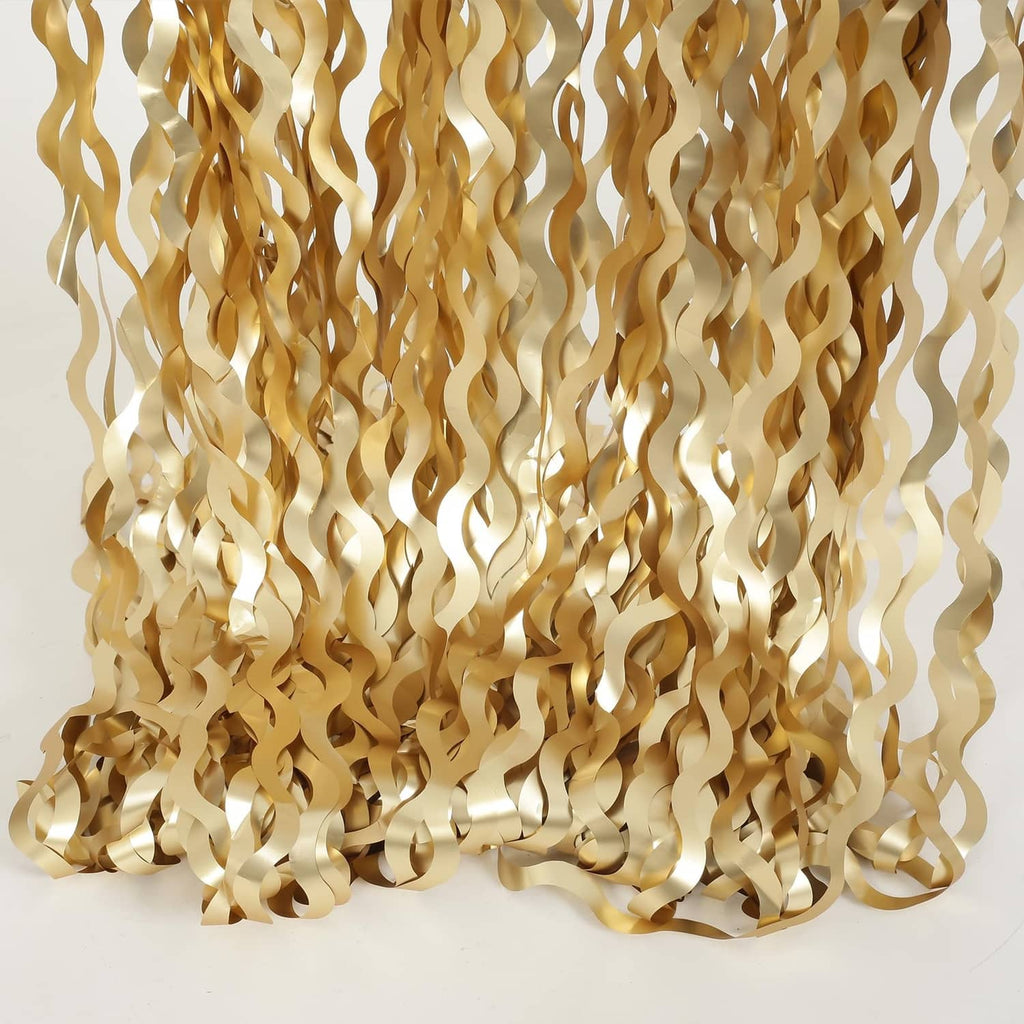 Champagne gold wavy metallic tinsel foil curtain panel with layered fringe at bottom