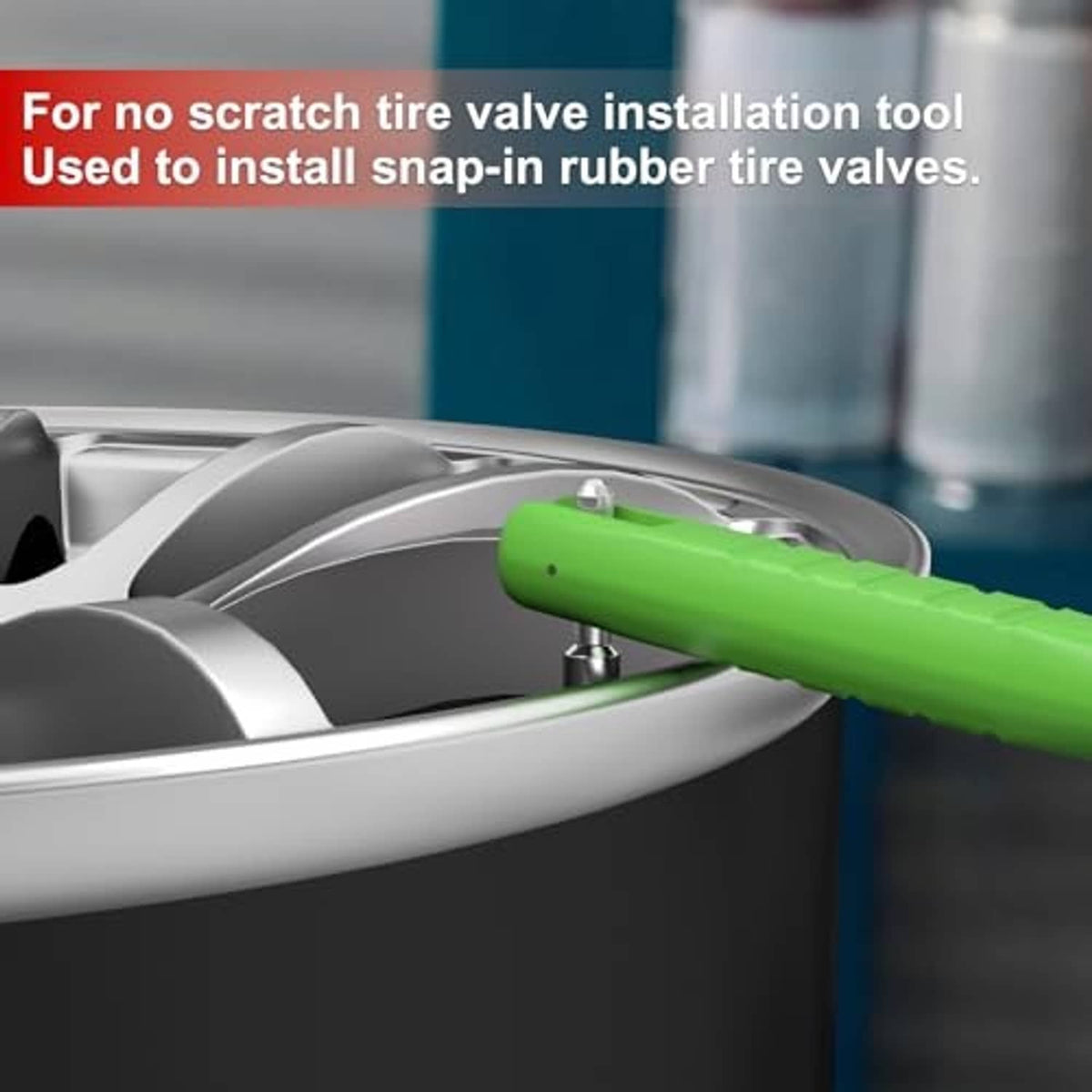 Green tire valve installation tool fitted at a car wheel valve stem