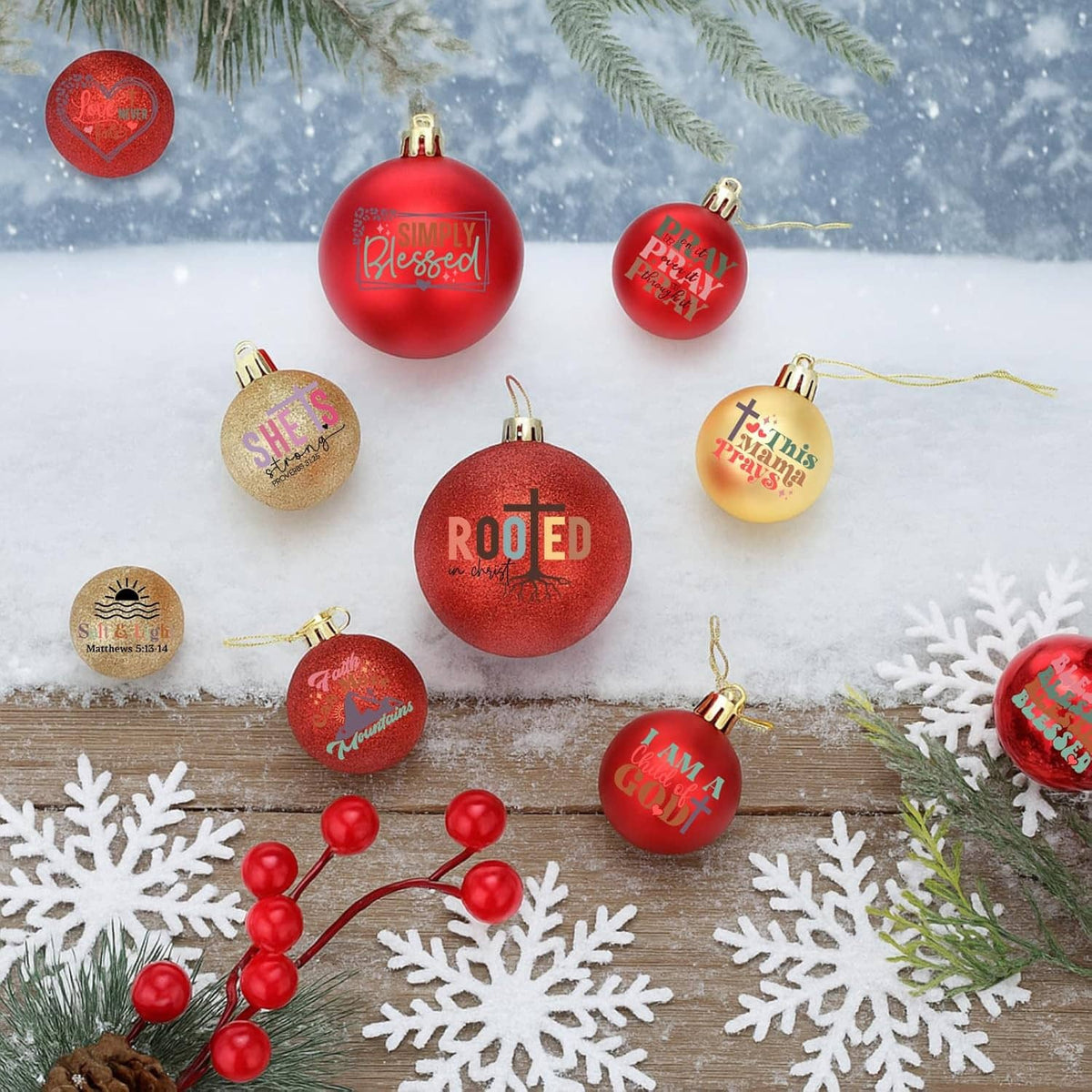 Set of round red and gold Christmas ornaments with faith sayings like PRAY and ROOTED