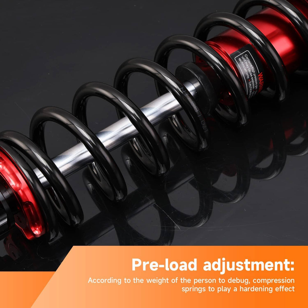 Black-spring rear shock absorber with red body and adjustable preload sleeve