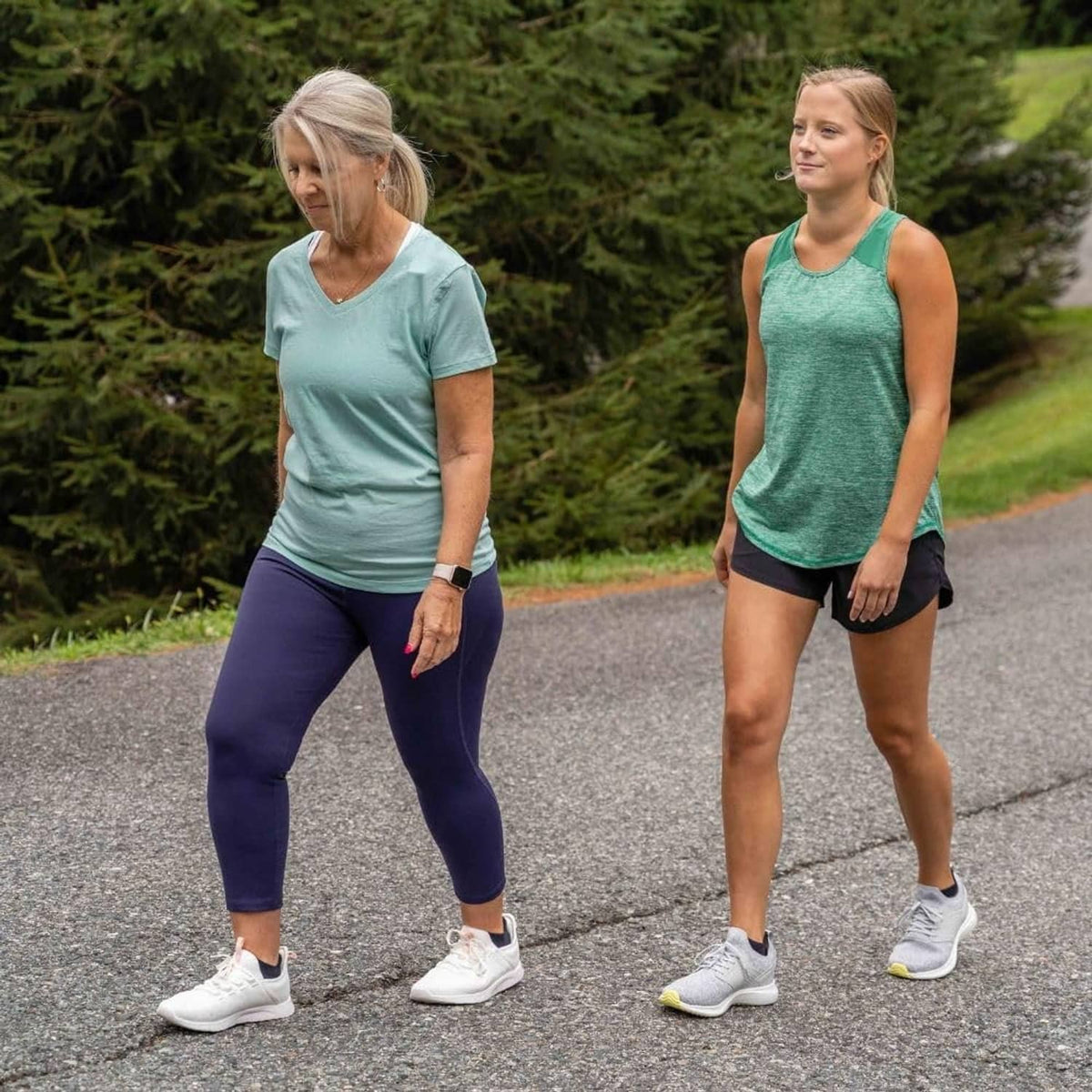 Light gray no-show socks worn with sneakers for everyday walking