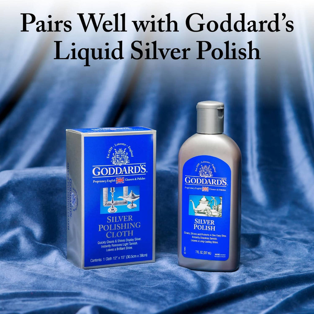 Silver polishing cloth box with bottle and polishing cloth set shown