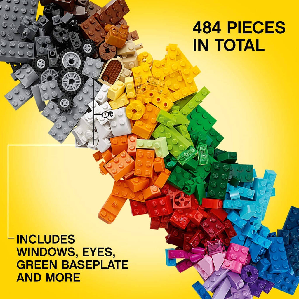 Pile of assorted multicolor LEGO bricks in yellow, green, red, blue, and gray