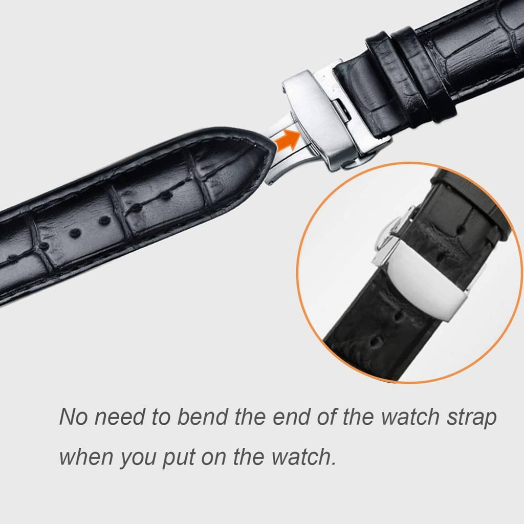 Silver deployant clasp on black leather watch strap end, secure snap housing shown