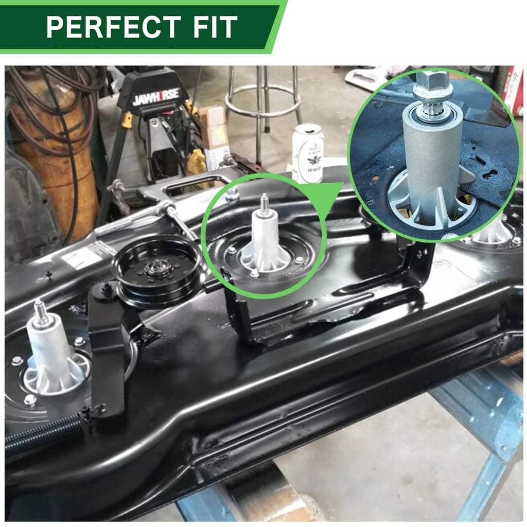 Mower deck spindle mounted on a metal bracket under the mower