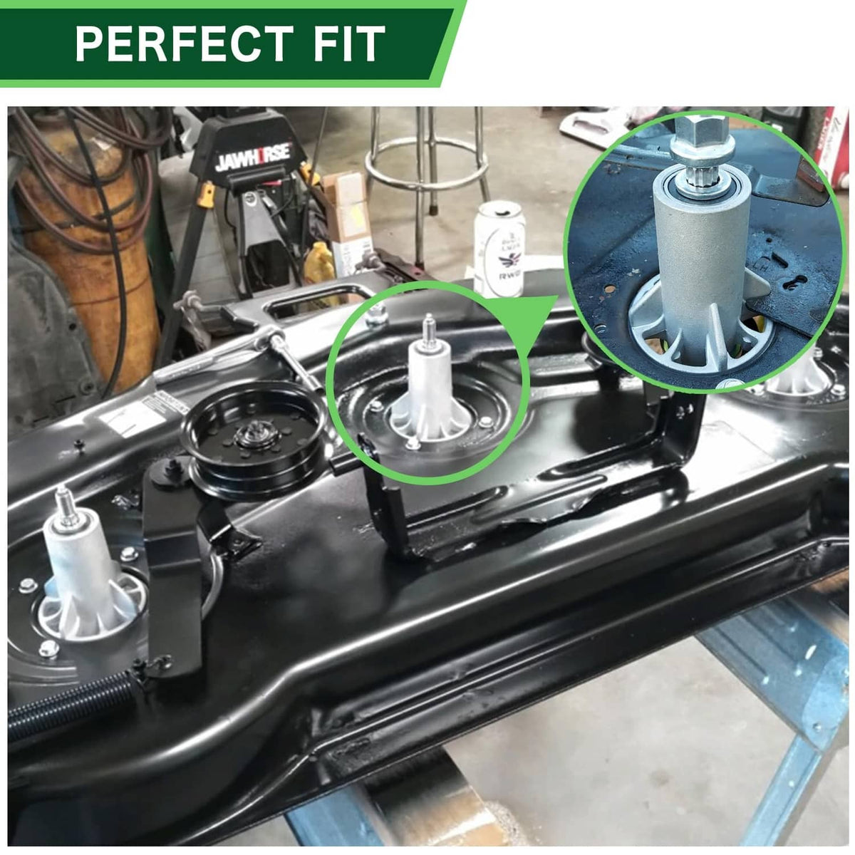 Mower deck spindle mounted on a metal bracket under the mower