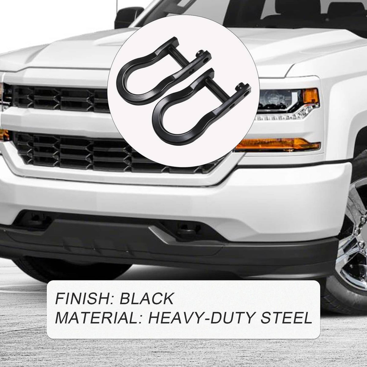 Black tow recovery hooks close-up on front grille area