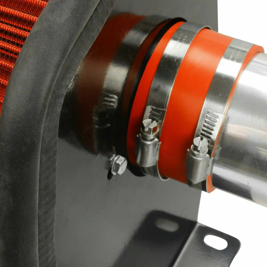 Cold air intake assembly with orange coupler and silver tube near black shield