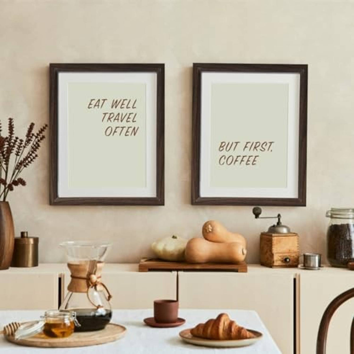 Two dark walnut picture frames on wall, quote prints with light background