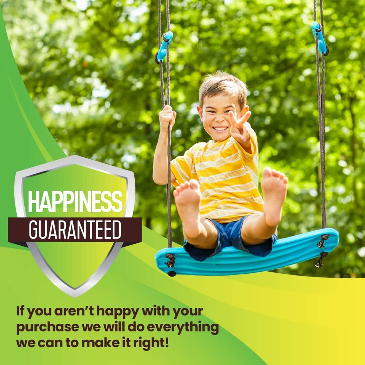 Smiling child seated on a turquoise surf swing board holding vertical rope handles