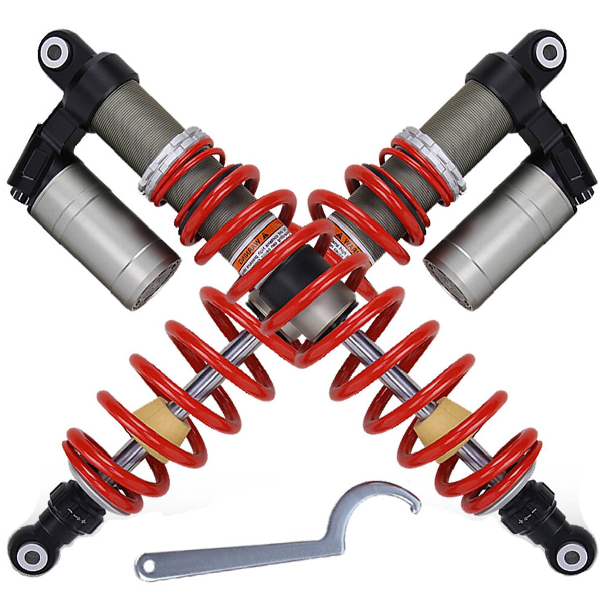 Pair of front shock absorbers with red coil springs, gray dampers, and silver wrench tool
