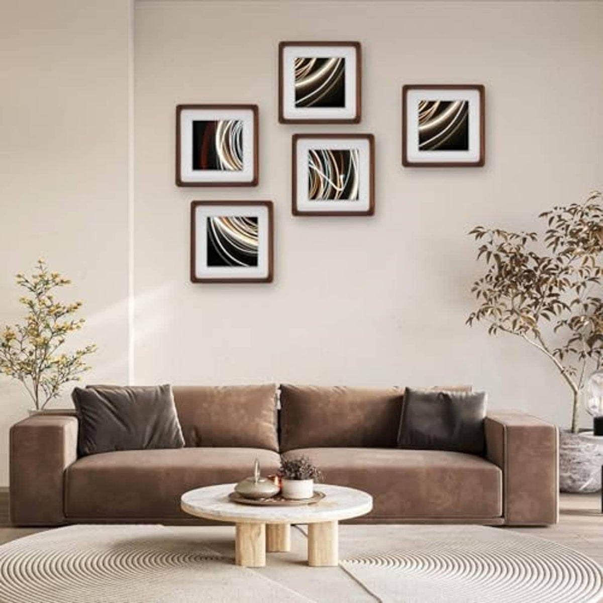 Group of small walnut wood picture frames with white mats on a wall.
