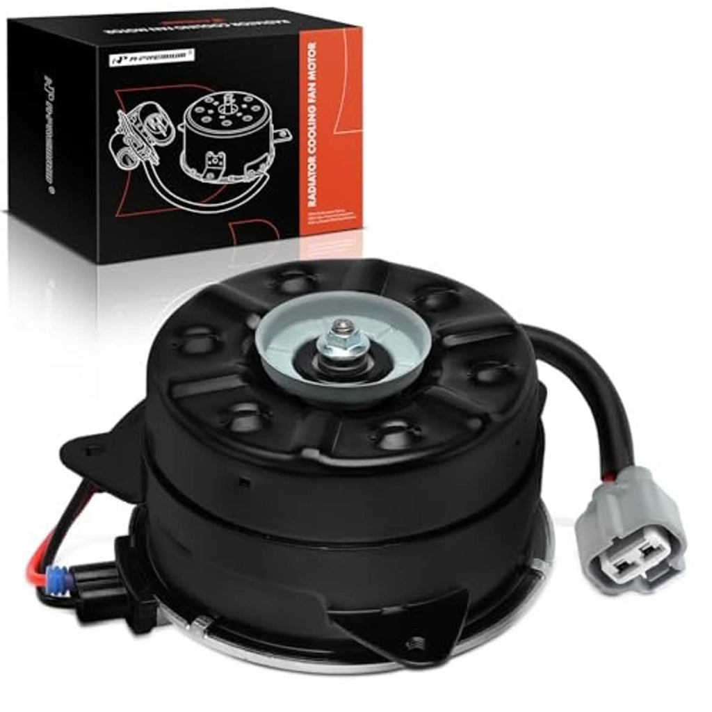 Black radiator fan motor with mounting hub and electrical plug, with retail box behind