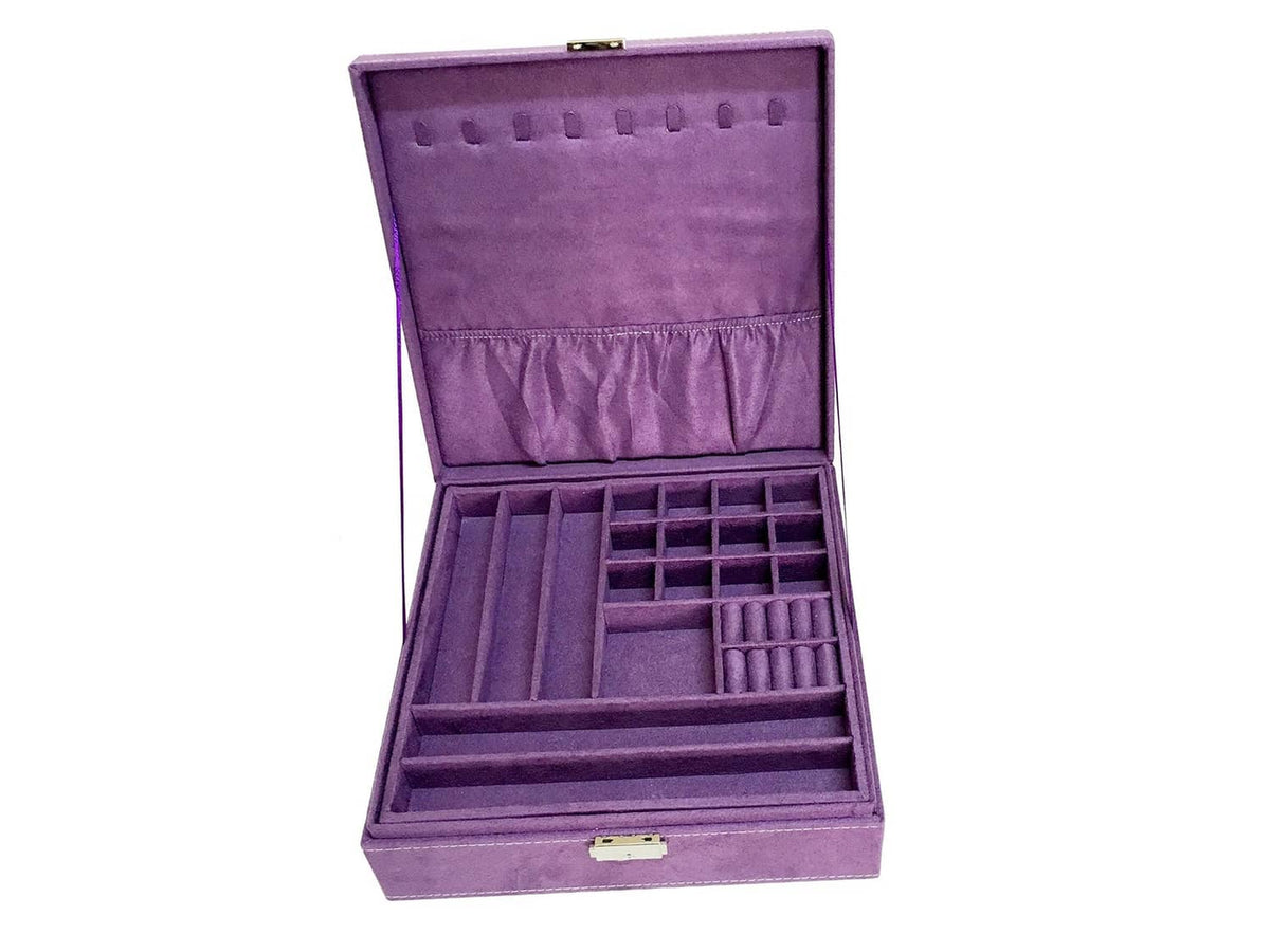 Purple jewelry box organizer, open with velvet backing and grid of compartments