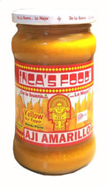 Glass jar of yellow hot pepper paste with label and lid