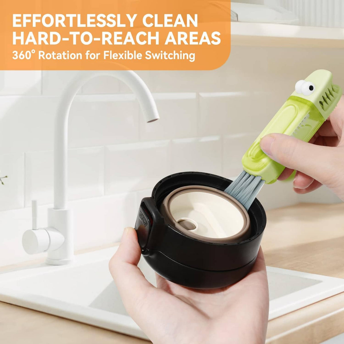 Small green brush cleaning a cup lid gap in a sink