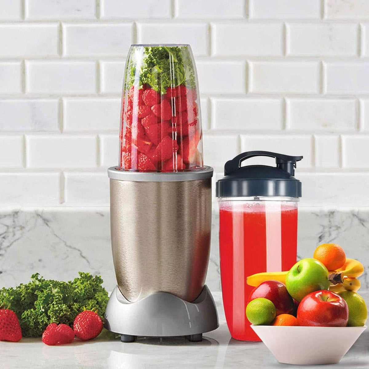 Clear fruit cup with black lid on silver base plus matching red cup with lid