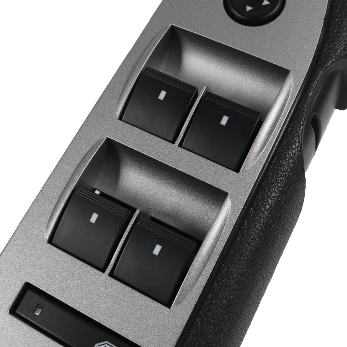 Close-up of power window switch rocker controls with black buttons and bezel trim.