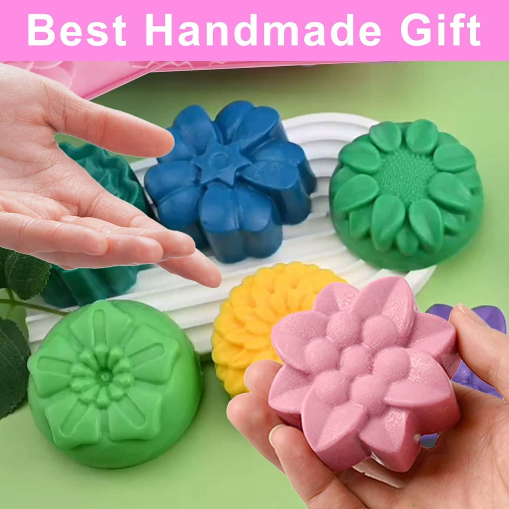 Hands holding flower-shaped molded soaps from colored silicone soap molds