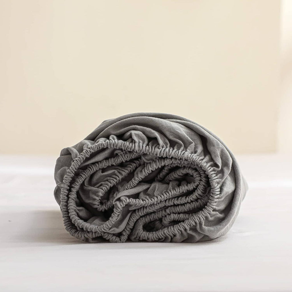 Rolled linen fitted sheet with elastic edge in dark gray