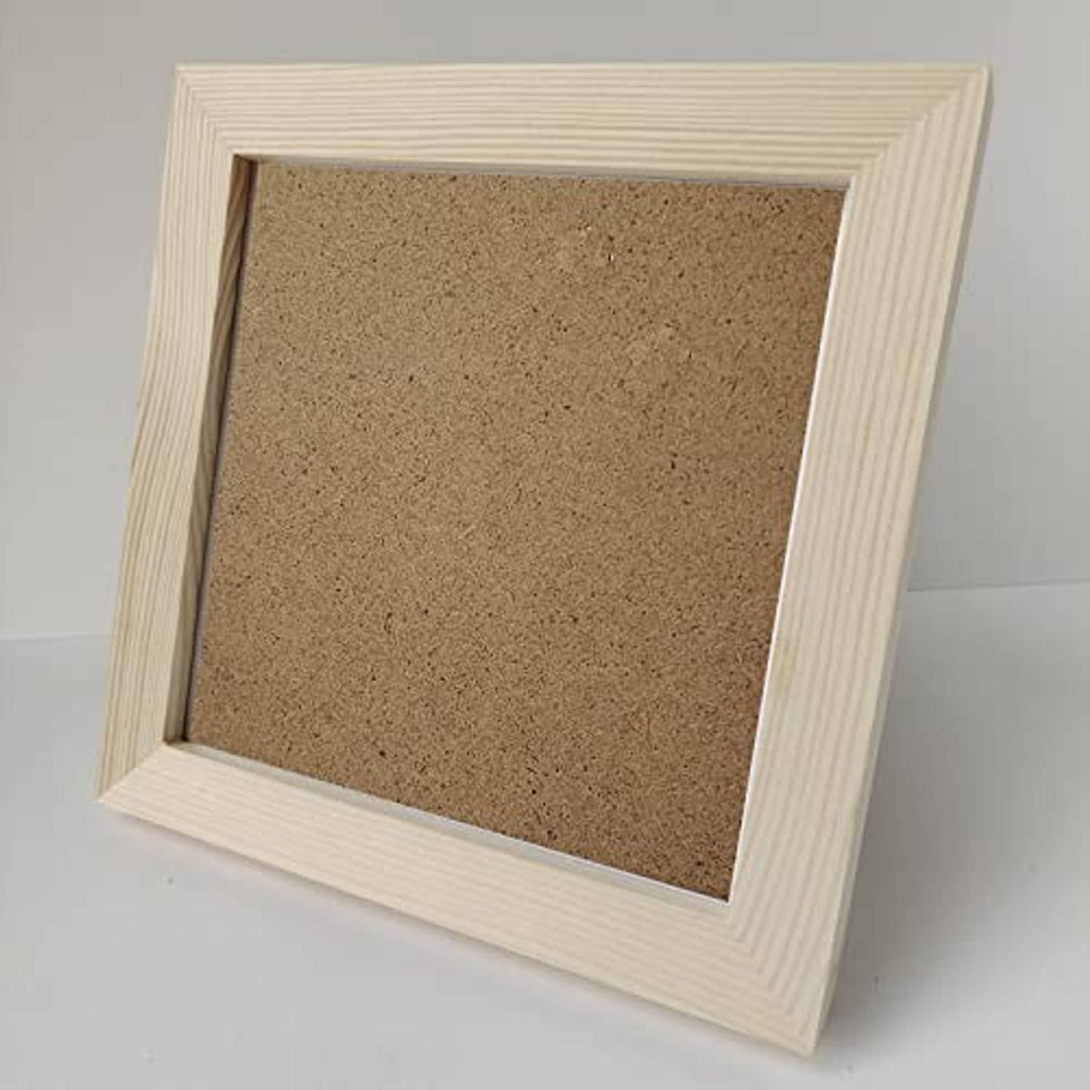 6x6 square solid wood photo frame, angled front view with cork backing board