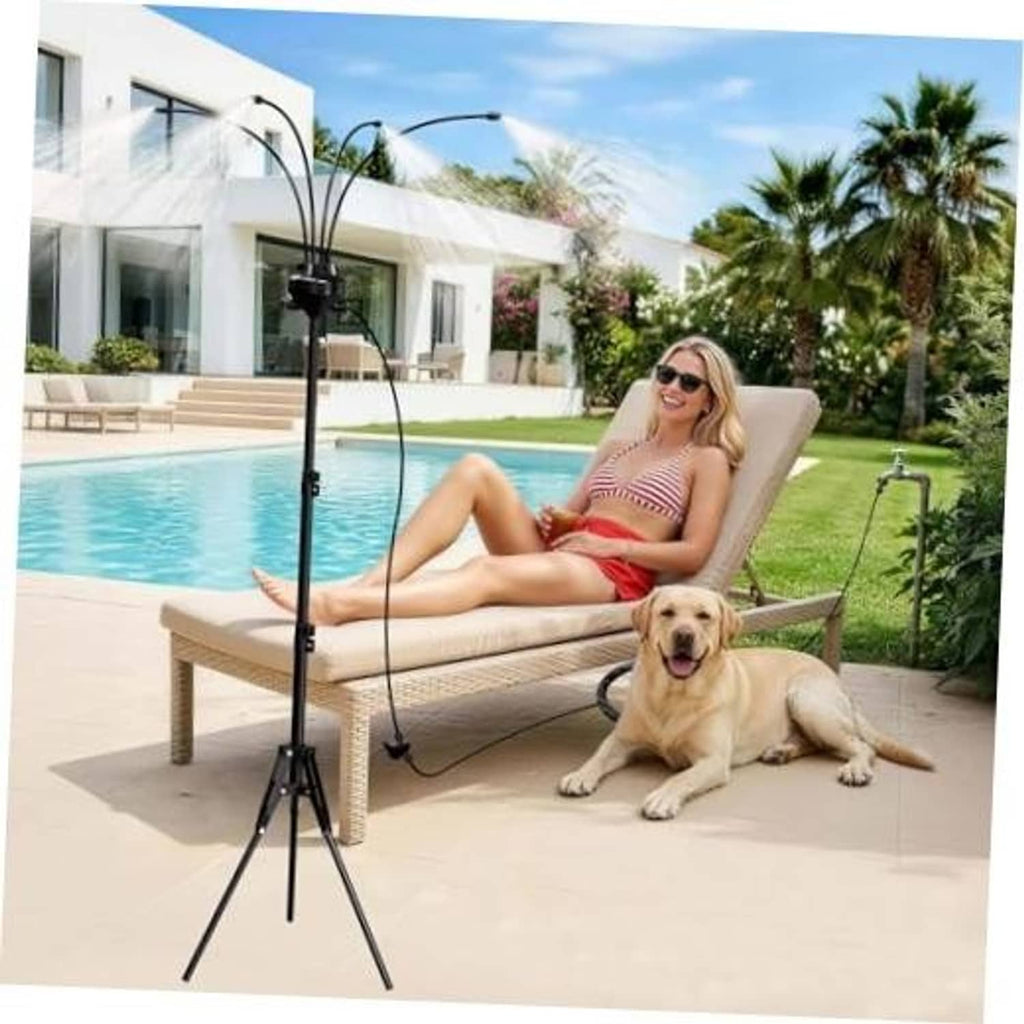 Black standing patio misting tripod with curved spray lines near poolside
